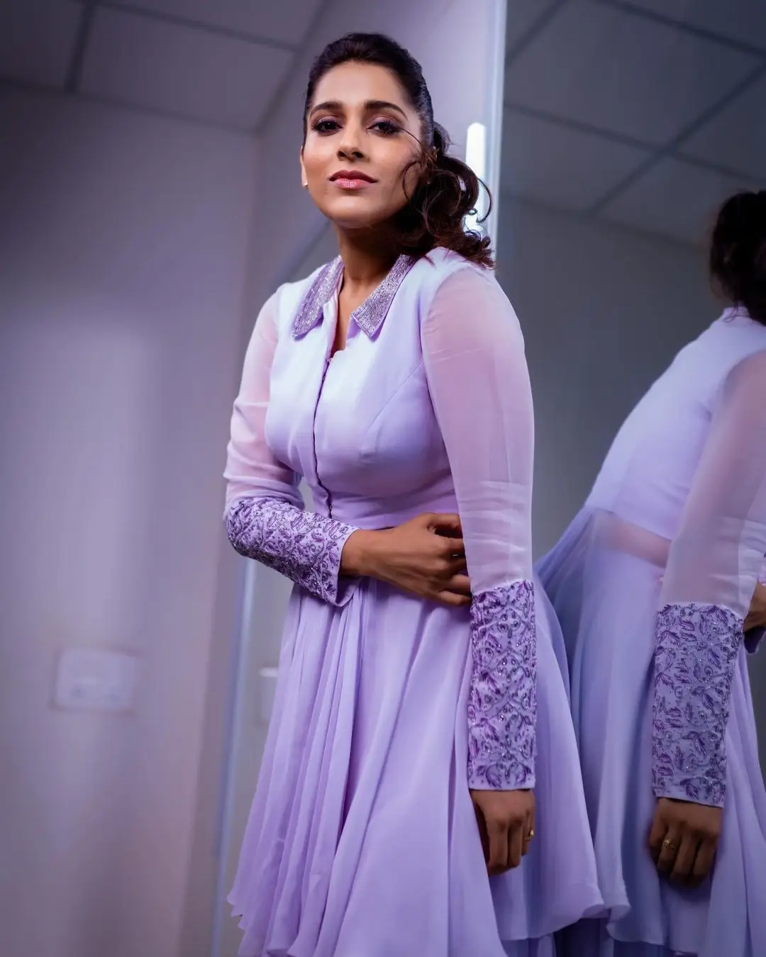 ETV Anchor Rashmi Gautam Photos In Violet Gown